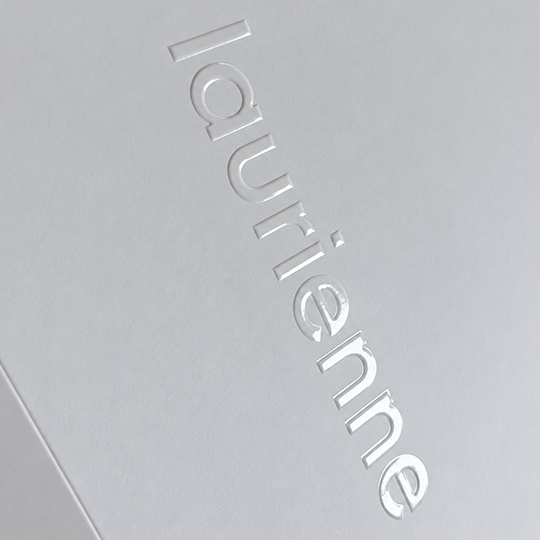 Spot UV on embossed logo